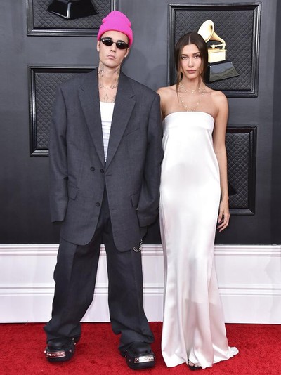 64th Annual Grammy Awards - Arrivals Justin Bieber, left, and Hailey Bieber arrive at the 64th Annual Grammy Awards at the MGM Grand Garden Arena on Sunday, April 3, 2022, in Las Vegas. (Photo by Jordan Strauss/Invision/AP)