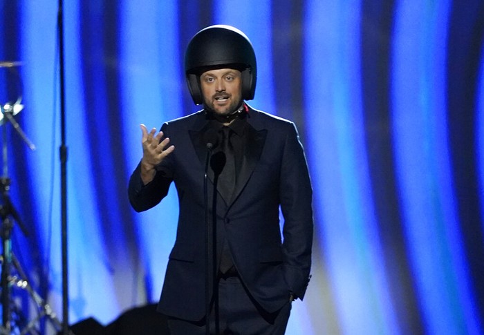 64th Annual Grammy Awards - Show Comedian Nate Bargatze speaks at the 64th Annual Grammy Awards on Sunday, April 3, 2022, in Las Vegas. (AP Photo/Chris Pizzello)