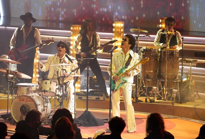 Anderson Paak, left, and Bruno Mars of Silk Sonic perform at the 64th Annual Grammy Awards on Sunday, April 3, 2022, in Las Vegas. (AP Photo/Chris Pizzello)