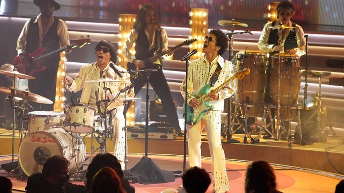 Anderson Paak, left, and Bruno Mars of Silk Sonic perform at the 64th Annual Grammy Awards on Sunday, April 3, 2022, in Las Vegas. (AP Photo/Chris Pizzello)