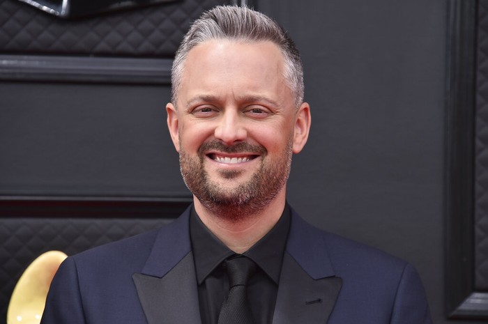 64th Annual Grammy Awards - Show Comedian Nate Bargatze speaks at the 64th Annual Grammy Awards on Sunday, April 3, 2022, in Las Vegas. (AP Photo/Chris Pizzello)