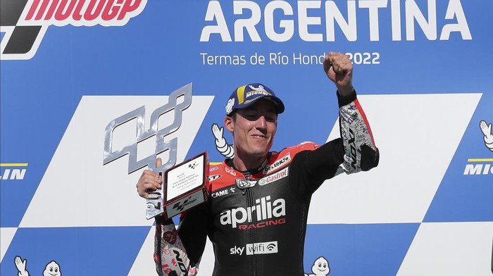 Spanish rider Aleix Espargaro of Aprilia Racing celebrates winning the MotoGP race at the circuit in Termas de Rio Hondo, Argentina, Sunday, April 3, 2022. (AP Photo/Nicolas Aguilera)