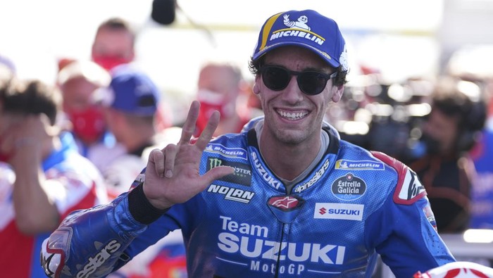 Spans rider Alex Rins of Team SUZUKI ECSTAR celebrates third place on the MotoGP race at the circuit in Termas de Rio Hondo, Argentina, Sunday, April 3, 2022. (AP Photo/Nicolas Aguilera)