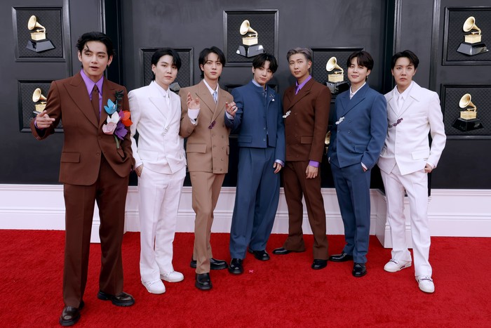 LAS VEGAS, NEVADA - APRIL 03: (L-R) V, Suga, Jin, Jungkook, RM, Jimin and J-Hope of BTS attend the 64th Annual GRAMMY Awards at MGM Grand Garden Arena on April 03, 2022 in Las Vegas, Nevada. (Photo by Frazer Harrison/Getty Images for The Recording Academy)