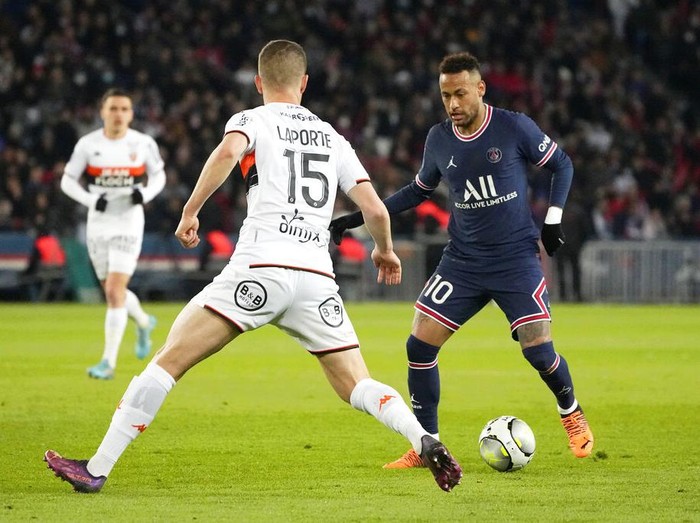PSG's Neymar scores his side's opening goal during the French League One soccer match between Paris Saint Germain and FC Lorient at Parc des Princes stadium in Paris, Sunday, April 3, 2022. (AP Photo/Michel Euler)