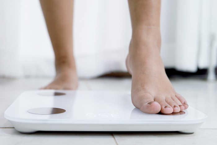 Ilustrasi Mengukur Berat Badan Ilustrasi Mengukur Berat Badan