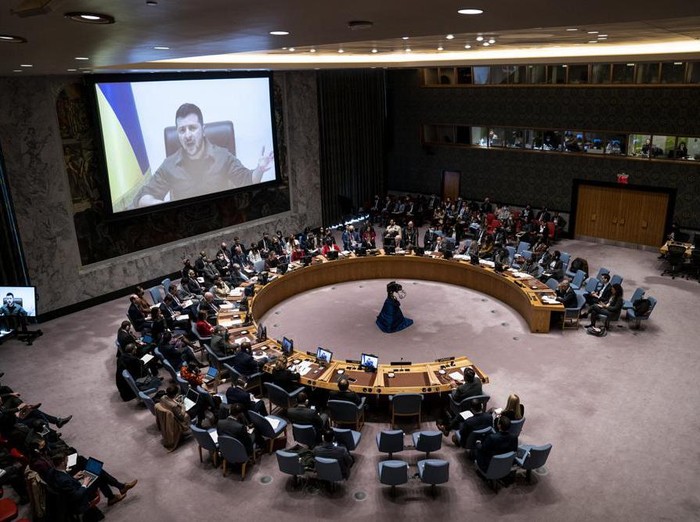 Ukrainian President Volodymyr Zelenskyy speaks via remote feed during a meeting of the UN Security Council, Tuesday, April 5, 2022, at United Nations headquarters. Zelenskyy will address the U.N. Security Council for the first time Tuesday at a meeting that is certain to focus on what appear to be widespread deliberate killings of civilians by Russian troops. (AP Photo/John Minchillo)