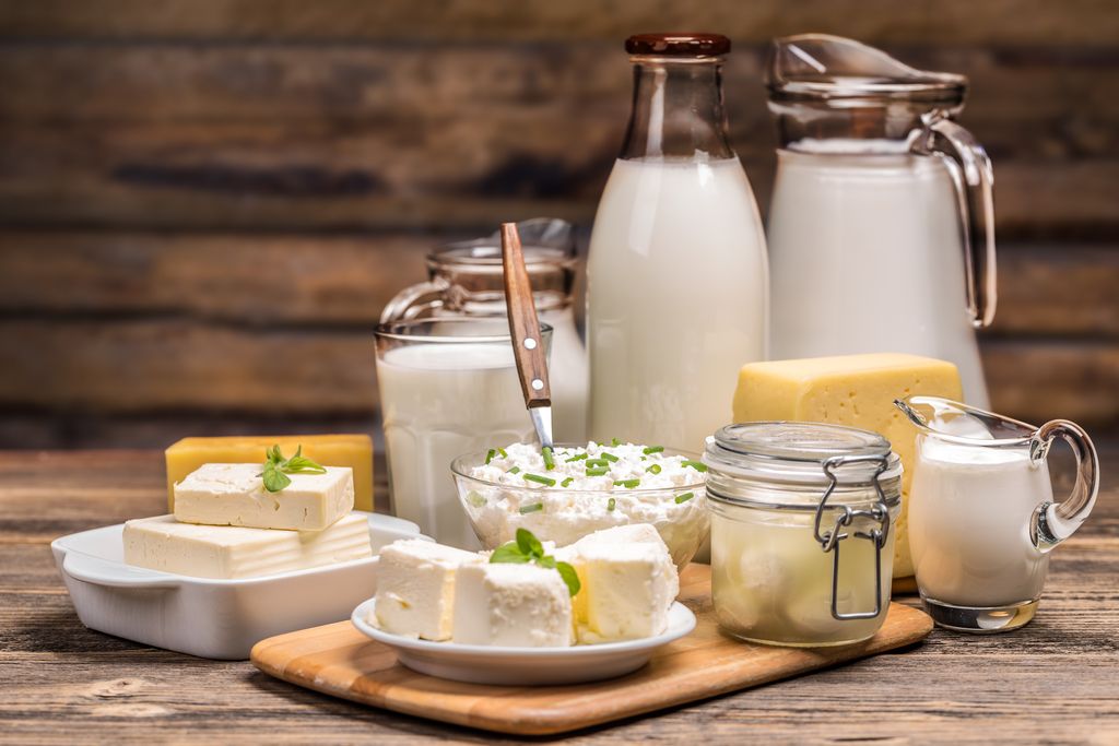 Still life with dairy product on wooden background