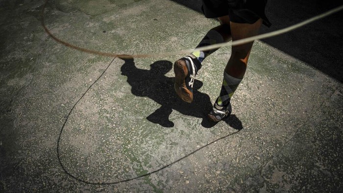 A boxer known as Jonathan trains at the Rafael Trejo boxing gym in Old Havana, Cuba, Wednesday, April 6, 2022. Cuba banned professional boxing shortly after the 1959 revolution, but boxers will be allowed to fight professionally in Cuba again for the first time under a deal with a Mexican promoter, officials announced March 4, 2022. (AP Photo/Ramon Espinosa)