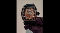 Jam tangan pertama itu bernomor seri RM 57-03 WG Black Sapphire Dragon. Dari video yang dikirim pihak Tony Sutrisno, jam tersebut tampak berwarna dominan hitam dengan aksen emas. (Dok Tony Sutrisno)