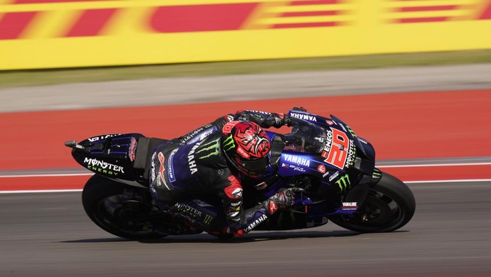 Fabio Quartararo (20), of France, steers through a turn during an open practice session for the MotoGP Grand Prix of the Americas motorcycle race at the Circuit of the Americas, Friday, April 8, 2022, in Austin, Texas. (AP Photo/Eric Gay)