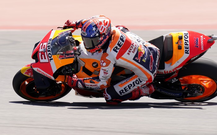 Marc Marquez (93), of Spain, steers through a turn during an open practice session for the MotoGP Grand Prix of the Americas motorcycle race at the Circuit of the Americas, Saturday, April 9, 2022, in Austin, Texas. (AP Photo/Eric Gay)