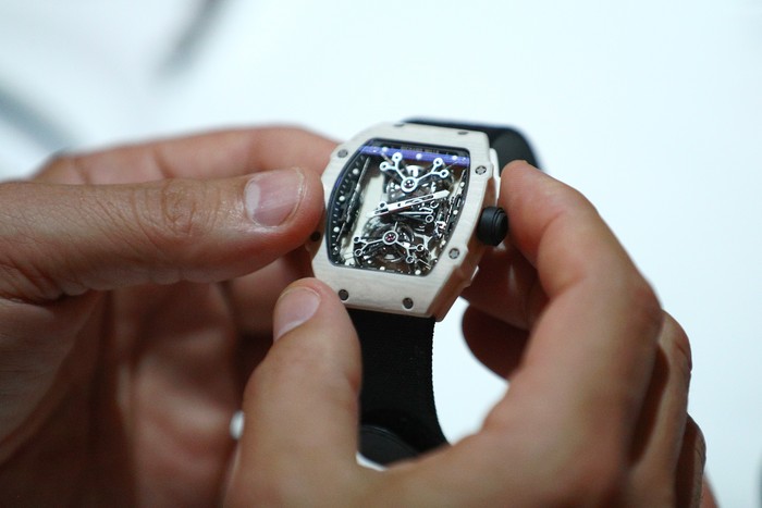 SHANGHAI, CHINA - OCTOBER 10:  Guests view watches during Richard Milles Rafael Nadal Collection exhibition on October 10, 2011 in Shanghai, China.  (Photo by Kevin Lee/Getty Images for Richard Mille)