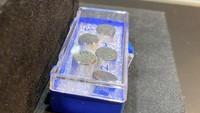 Views of items on display at Bonhams, as a Moon dust sample from the Apollo 11 mission is up for auction, in New York City, U.S., April 11, 2022. REUTERS/Christine Kiernan