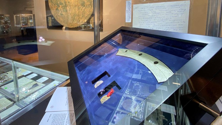 Views of items on display at Bonhams, as a Moon dust sample from the Apollo 11 mission is up for auction, in New York City, U.S., April 11, 2022. REUTERS/Christine Kiernan