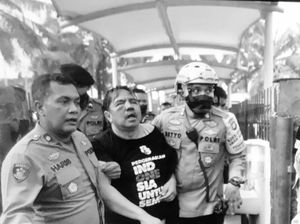 Ade Purnama dan Pria Bertopi Diburu Polisi Terkait Pengeroyokan Ade Armando