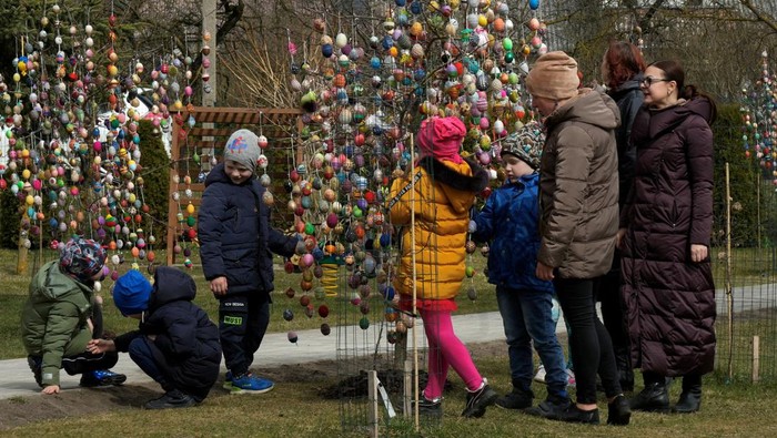 Trees decorated with thousands of Easter eggs are seen in the kindergarten in Seduva, Lithuania April 11, 2022. REUTERS/Ints Kalnins