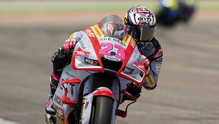 Enea Bastianini (23), of Italy, speeds out of a turn during the MotoGP Grand Prix of the Americas motorcycle race at the Circuit of the Americas, Sunday, April 10, 2022, in Austin, Texas. Bastianini won the race. (AP Photo/Eric Gay)