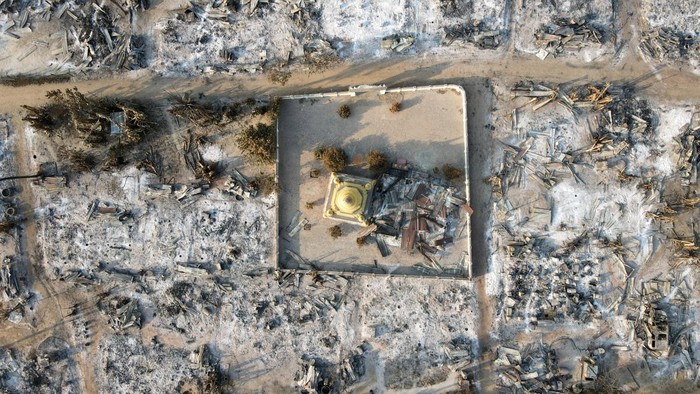 An aerial view of Bin village of the Mingin Township in Sagaing region after villagers say it was set ablaze by the Myanmar military, in Myanmar February 3, 2022. Picture taken February 3, 2022. Picture taken with a drone. REUTERS/Stringer