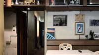 Jauh dari kesan modern, bagian dalam restoran diisi dengan kursi plastik dan meja kayu sederhana. Bagian atas dinding restoran dipenuhi foto mendiang Raja Bhumibol Adulyadej. Foto: Poj Spa kar/Site Instagram