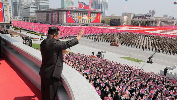 North Korean leader Kim Jong Un waves as he attends a national meeting and a public procession to mark 110th birth anniversary of the state's founder, Kim II Sung, in Pyongyang, North Korea, April 15, 2022. Picture taken April 15, 2022 by North Korea's Korean Central News Agency (KCNA). KCNA via REUTERS    ATTENTION EDITORS - THIS IMAGE WAS PROVIDED BY A THIRD PARTY. REUTERS IS UNABLE TO INDEPENDENTLY VERIFY THIS IMAGE. NO THIRD PARTY SALES. SOUTH KOREA OUT. NO COMMERCIAL OR EDITORIAL SALES IN SOUTH KOREA.