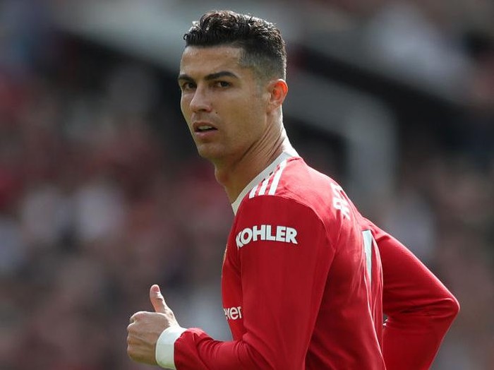 MANCHESTER, ENGLAND - APRIL 16: Cristiano Ronaldo of Manchester United in actio during the Premier League match between Manchester United and Norwich City at Old Trafford on April 16, 2022 in Manchester, England. (Photo by Jan Kruger/Getty Images)