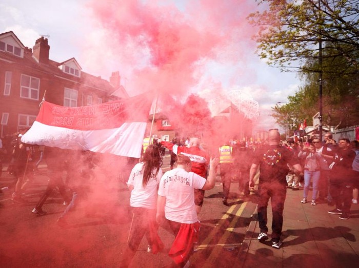 MANCHESTER, ENGLAND - APRIL 16: Manchester United fans take part in a protest outside the stadium prior to the Premier League match between Manchester United and Norwich City at Old Trafford on April 16, 2022 in Manchester, England. (Photo by Naomi Baker/Getty Images)