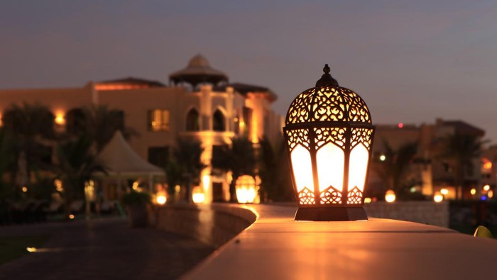An arabesque lantern lamp Symbol of Ramadan times, also a famous Middle eastern (specially in morocco and Egypt) lighting decoration item..Some copy space was left up to fit greeting or title textMore Similar and Arabia Related..