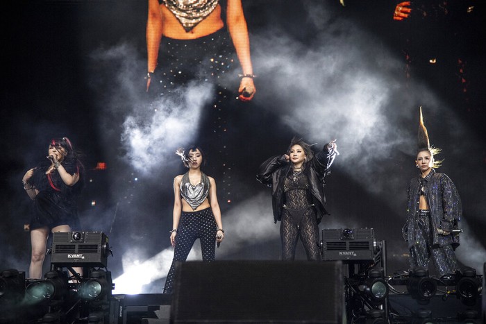 EDS NOTE: OBSCENITY - Dara, from left, Park Bom, CL, and Minzy of 2NE1 perform at the Coachella Music & Arts Festival at the Empire Polo Club on Saturday, April 16, 2022, in Indio, Calif. (Photo by Amy Harris/Invision/AP)