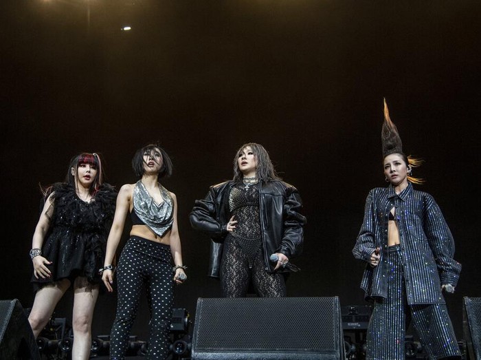 EDS NOTE: OBSCENITY - Dara, from left, Park Bom, CL, and Minzy of 2NE1 perform at the Coachella Music & Arts Festival at the Empire Polo Club on Saturday, April 16, 2022, in Indio, Calif. (Photo by Amy Harris/Invision/AP)