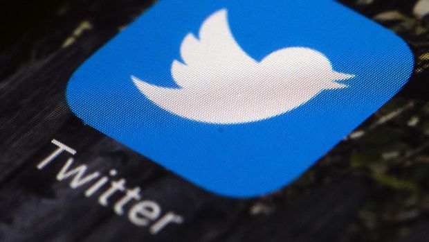 FILE-  The Twitter icon is displayed on a mobile phone in Philadelphia on April 26, 2017. Tesla CEO Elon Musk won't be joining Twitter's board of directors as previously announced. The tempestuous billionaire remains Twitter’s largest shareholder. Twitter CEO Parag Agrawal tweeted the news, which followed a weekend of Musk tweets suggesting possible changes to Twitter, including making the site ad-free. Nearly 90% of Twitter's 2021 revenue came from ads. (AP Photo/Matt Rourke, File)