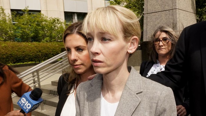 California Faked Kidnapping FILE - Sherri Papini of Redding leaves the federal courthouse after her arraignment in Sacramento, Calif., April 13, 2022. During a virtual hearing Papini accepted a plea bargain with prosecutors and pleaded guilty, Monday, April 18, 2022, to a single count of mail fraud and one count of making false statements. She will be sentenced on July 11, 2022. (AP Photo/Rich Pedroncelli, File)