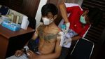 Jelang Lebaran, Warga Antre Hapus Tato Gratis