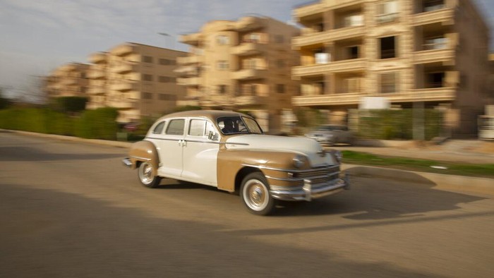 Automobile enthusiasts visit a classic car show in Cairo, Egypt, March 19, 2022. (AP Photo/Amr Nabil)