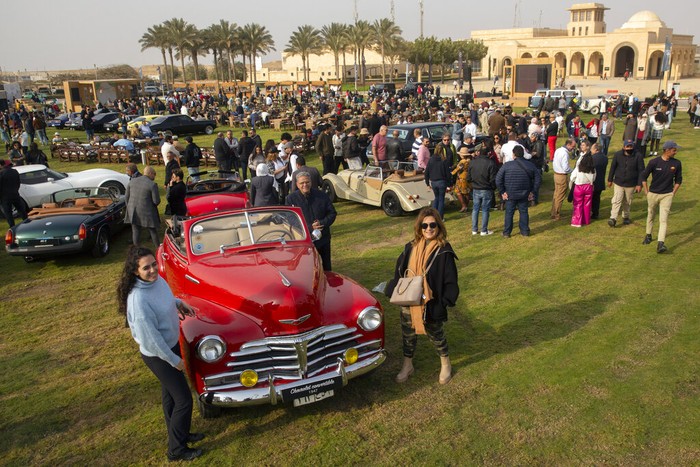 Automobile enthusiasts visit a classic car show in Cairo, Egypt, March 19, 2022. (AP Photo/Amr Nabil)