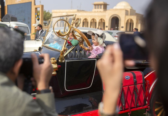 Automobile enthusiasts visit a classic car show in Cairo, Egypt, March 19, 2022. (AP Photo/Amr Nabil)