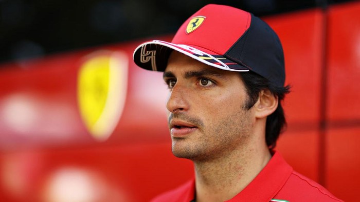 MELBOURNE, AUSTRALIA - APRIL 07: Carlos Sainz of Spain and Ferrari looks on in the Paddock during previews ahead of the F1 Grand Prix of Australia at Melbourne Grand Prix Circuit on April 07, 2022 in Melbourne, Australia. (Photo by Robert Cianflone/Getty Images)