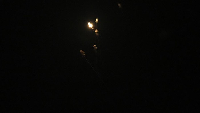 Israel's Iron Dome air defense system launches missiles to intercept rockets fired from the Gaza Strip toward Israel, over Gaza City, early Thursday, April 21, 2022. (AP Photo/Adel Hana)