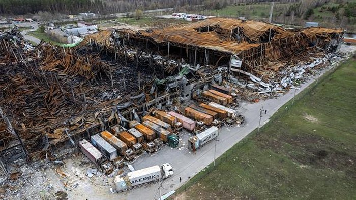 MAKARIV, UKRAINE - APRIL 19: (EDITORS NOTE: This photograph was taken using a drone) As seen from the air, the massive Komodor logistics park lies in ruins, after being bombed and burnt during the Russian invasion on April 19, 2022 near Makariv, Ukraine. The attack in early March destroyed some $50 million of medicines and medical raw materials for Ukrainian pharmaceutical company Farmac, according to Forbes. Losses for other tenants of the 400,000 square meter facility are yet unknown. (Photo by John Moore/Getty Images)