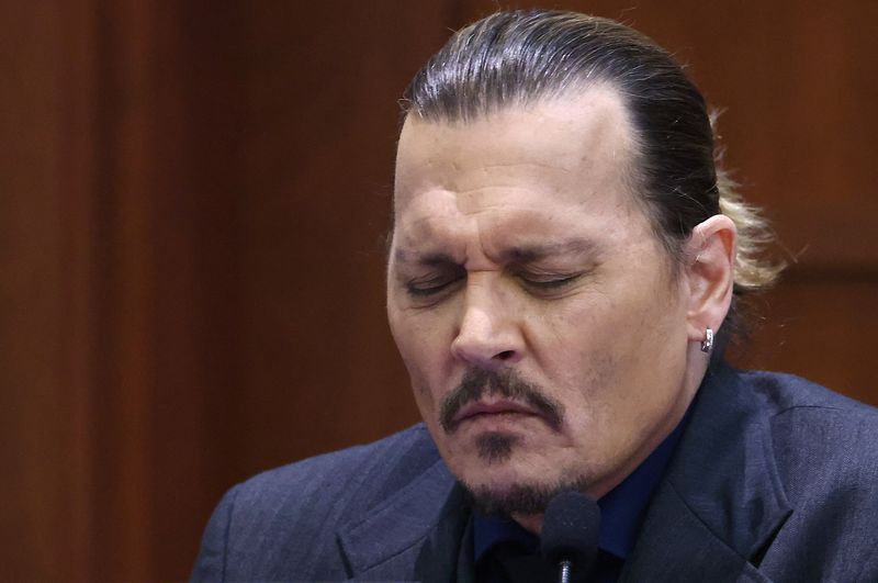 PEOPLE-DEPP/ US actor Johnny Depp testifies during the 50 million US dollar Depp vs Heard defamation trial at the Fairfax County Circuit Court in Fairfax, Virginia, U.S., April 21, 2022. Jim Lo Scalzo/Pool via REUTERS