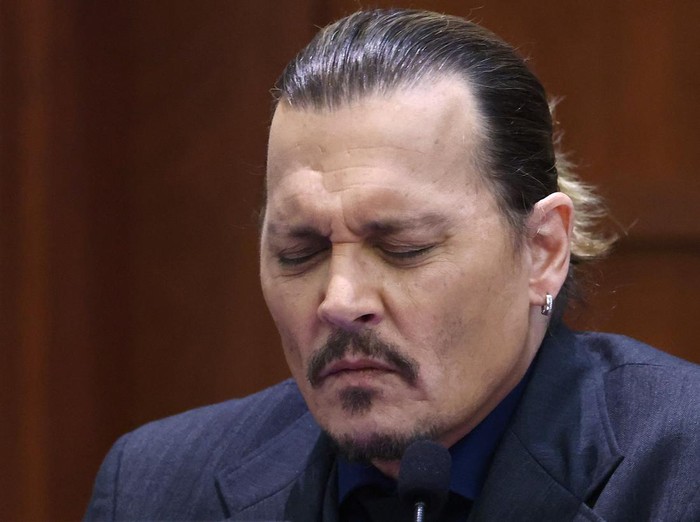 US actor Johnny Depp testifies during the 50 million US dollar Depp vs Heard defamation trial at the Fairfax County Circuit Court in Fairfax, Virginia, U.S., April 21, 2022. Jim Lo Scalzo/Pool via REUTERS