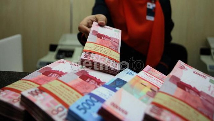 rupiah ilustrasi angsuran KUR