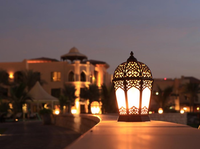 An arabesque lantern lamp Symbol of Ramadan times, also a famous Middle eastern (specially in morocco and Egypt) lighting decoration item..Some copy space was left up to fit greeting or title textMore Similar and Arabia Related..