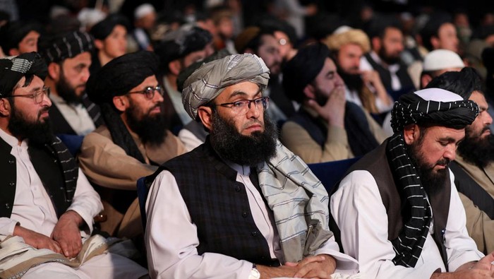 Taliban fighters stand guard at the death anniversary event of Mullah Mohammad Omar, the late leader and founder of the Taliban, in Kabul, Afghanistan, April 24, 2022. REUTERS/Ali Khara