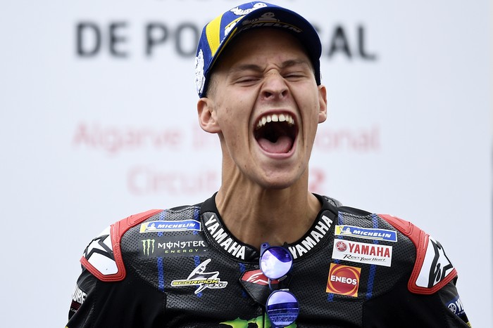 MotoGP rider Fabio Quartararo of France reacts after winning the Algarve Motorcycle Grand Prix, at the Algarve International circuit near Portimao, Portugal, Sunday, April 24, 2022. (AP Photo/Jose Breton)