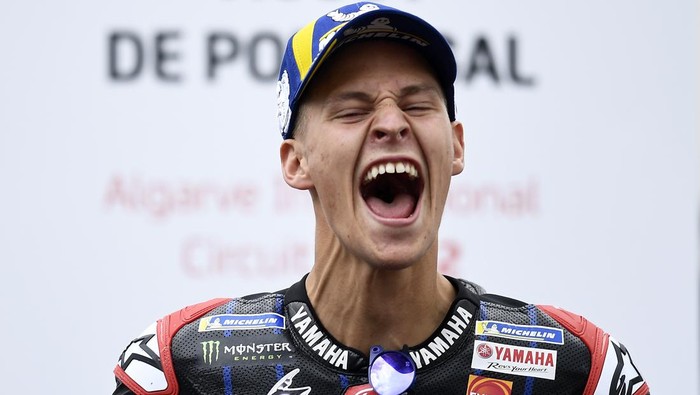 MotoGP rider Fabio Quartararo of France reacts after winning the Algarve Motorcycle Grand Prix, at the Algarve International circuit near Portimao, Portugal, Sunday, April 24, 2022. (AP Photo/Jose Breton)