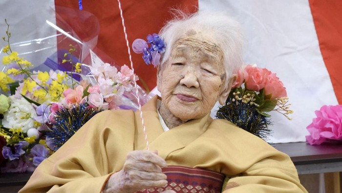 FILE PHOTO: 116-year-old Japanese woman Kane Tanaka celebrates during a ceremony to recognise her as the world's oldest person living and world's oldest woman living by the Guinness World Records in Fukuoka, Japan March 9, 2019.  Mandatory credit Kyodo/via REUTERS  ATTENTION EDITORS - THIS IMAGE WAS PROVIDED BY A THIRD PARTY. MANDATORY CREDIT. JAPAN OUT. THIS IMAGE WAS PROCESSED BY REUTERS TO ENHANCE QUALITY, AN UNPROCESSED VERSION HAS BEEN PROVIDED SEPARATELY./File Photo