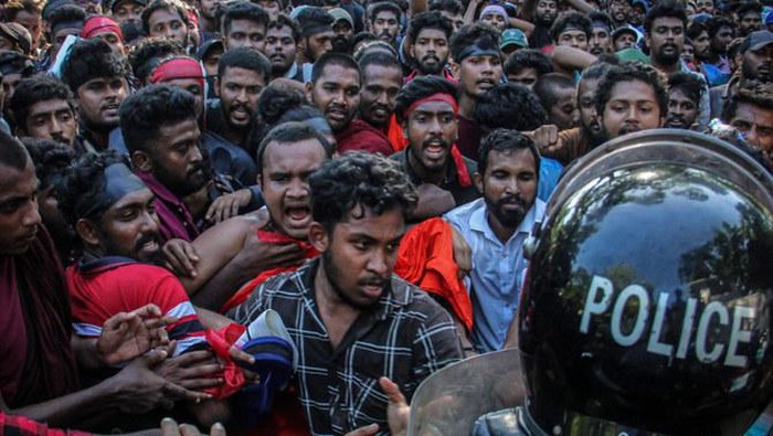 University students protest outside the residence of Sri Lanka’s prime minister Mahinda Rajapaksa during a demonstration over the country’s crippling economic crisis in Colombo on April 24, 2022. (AFP)