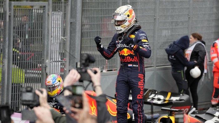 Red Bull driver Max Verstappen of the Netherlands celebrates after winning the Emilia Romagna Formula One Grand Prix, at the Enzo and Dino Ferrari racetrack, in Imola, Italy, Sunday, April 24, 2022. (AP Photo/Luca Bruno)