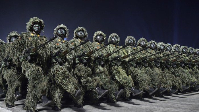 NORTHKOREA-MILITARY/ANNIVERSARY Hwasong-17 intercontinental ballistic missiles take part in a nighttime military parade to mark the 90th anniversary of the founding of the Korean People's Revolutionary ArmyΒ in Pyongyang, North Korea, in this undated photo released by North Korea's Korean Central News Agency (KCNA) on April 26, 2022. KCNA via REUTERSΒ ATTENTION EDITORS - THIS IMAGE WAS PROVIDED BY A THIRD PARTY. REUTERS IS UNABLE TO INDEPENDENTLY VERIFY THIS IMAGE. NO THIRD PARTY SALES. SOUTH KOREA OUT. NO COMMERCIAL OR EDITORIAL SALES IN SOUTH KOREA. TPX IMAGES OF THE DAY